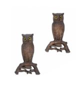 A PAIR OF PATINATED METAL WALL MOUNTED MODELS OF OWLS