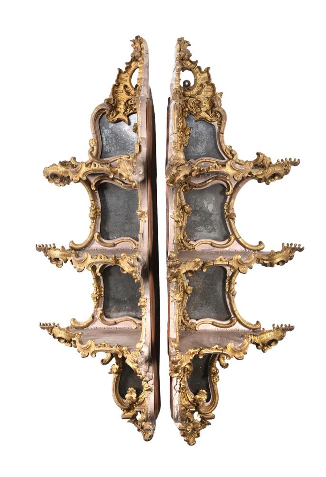 A PAIR OF GILTWOOD AND COMPOSITION CORNER WALL SHELVES IN ROCOCO STYLE