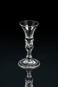 A BALUSTER GIN OR DRAM GLASS