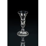 A BALUSTER GIN OR DRAM GLASS