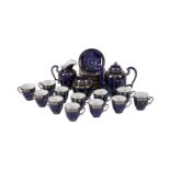 A SEVRES BLUE GROUND AND GILT PART COFFEE SERVICE