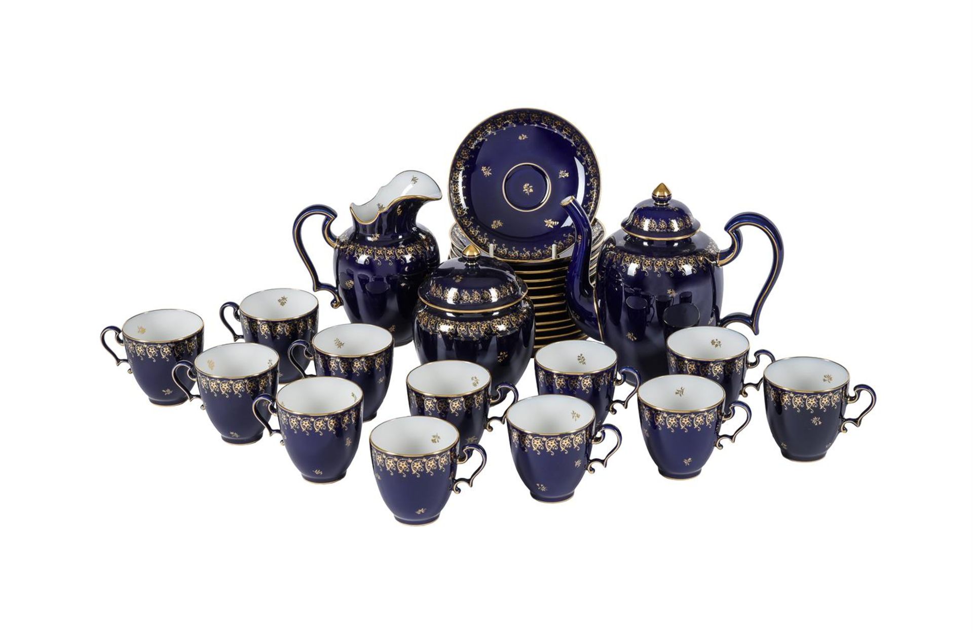 A SEVRES BLUE GROUND AND GILT PART COFFEE SERVICE