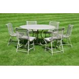 A SET OF GARDEN FURNITURE COMPRISING A CIRCULAR TABLE AND SIX CHAIRS