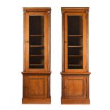 A PAIR OF VICTORIAN OAK AND PARCEL GILT BOOKCASES