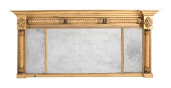 A GILTWOOD AND COMPOSITION OVERMANTEL WALL MIRROR