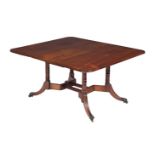 A GEORGE IV MAHOGANY DROP LEAF DINING TABLE