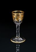 A FACET-STEMMED GILT DECORATED WINE GLASS OF JAMES GILES TYPE