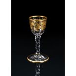 A FACET-STEMMED GILT DECORATED WINE GLASS OF JAMES GILES TYPE