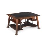 AN ARTS AND CRAFTS OAK WRITING TABLE CIRCA 1900