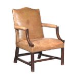 A GEORGE III MAHOGANY AND LEATHER UPHOLSTERED OPEN ARMCHAIR