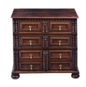 A CHARLES II OAK CHEST OF DRAWERS