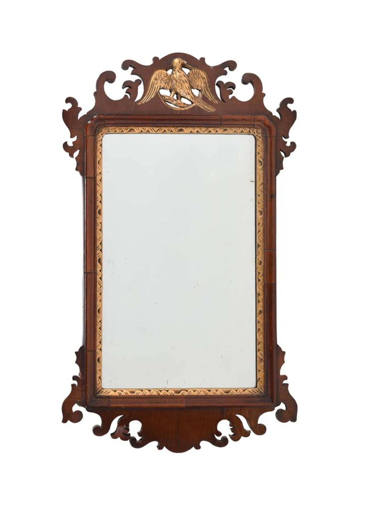 A GEORGE III MAHOGANY AND PARCEL GILT FRETWORK WALL MIRROR