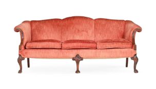 A CARVED MAHOGANY AND UPHOLSTERED SOFA IN GEORGE III STYLE