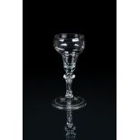 A BALUSTROID WINE GLASS