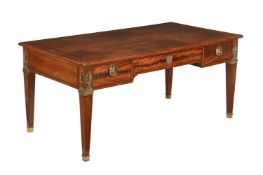 A MAHOGANY AND ORMOLU MOUNTED BUREAU-PLAT IN EMPIRE STYLE