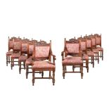 A SET OF TEN EDWARDIAN CARVED WALNUT DINING CHAIRS