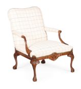 A STAINED BEECH OPEN ARMCHAIR IN 18TH CENTURY STYLE