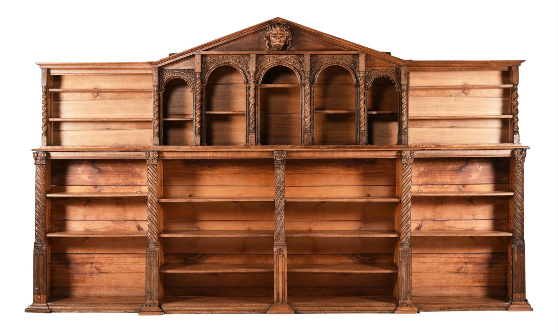 A VICTORIAN CARVED OAK LIBRARY BOOKCASE