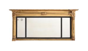 A GEORGE IV GILTWOOD AND COMPOSITION OVERMANTEL MIRROR