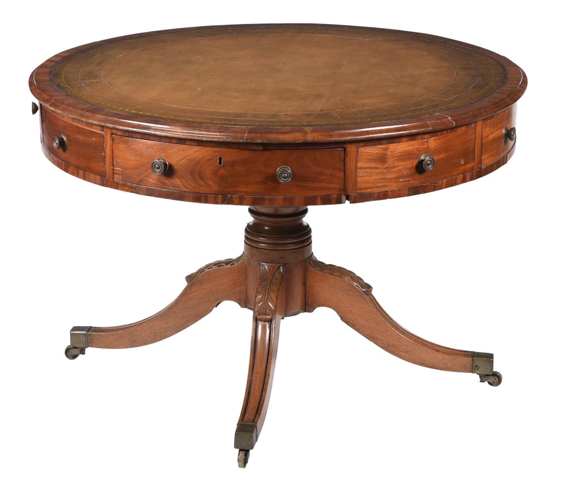 A GEORGE IV MAHOGANY DRUM LIBRARY TABLE