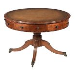 A GEORGE IV MAHOGANY DRUM LIBRARY TABLE