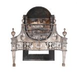 A STEEL AND CAST IRON FIREGRATE IN GEORGE III 'ADAM' STYLE