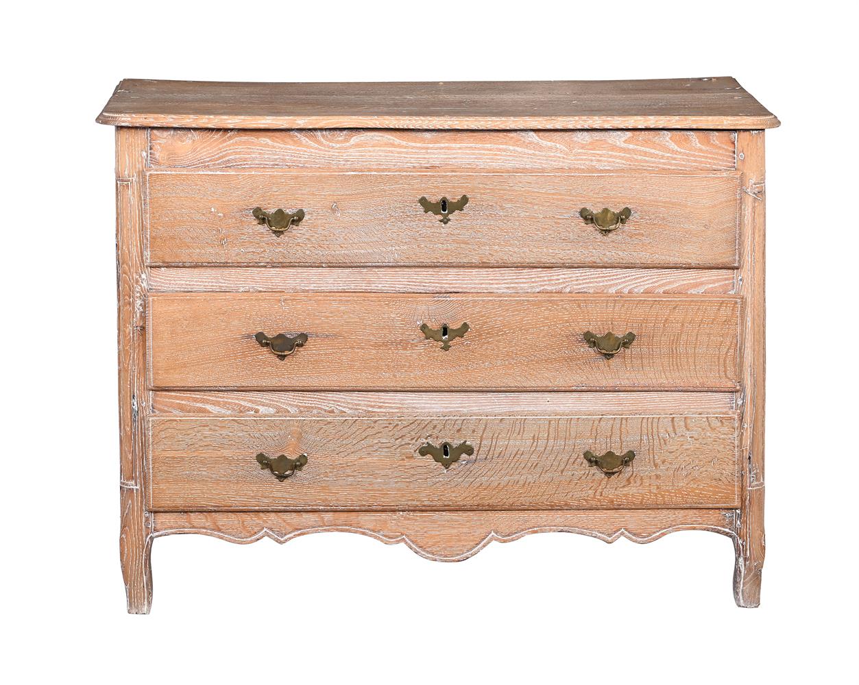 A FRENCH LIMED OAK CHEST OF DRAWERSPROBABLY PROVENCAL