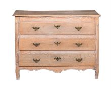 A FRENCH LIMED OAK CHEST OF DRAWERSPROBABLY PROVENCAL