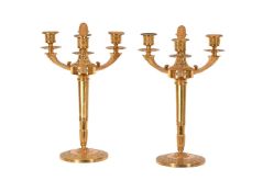 A PAIR OF MODERN GILT METAL THREE ARM CANDELABRA IN EMPIRE STYLE