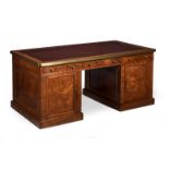 A GEORGE IV OAK AND POLLARD OAK PEDESTAL PARTNER'S DESK, CIRCA 1825