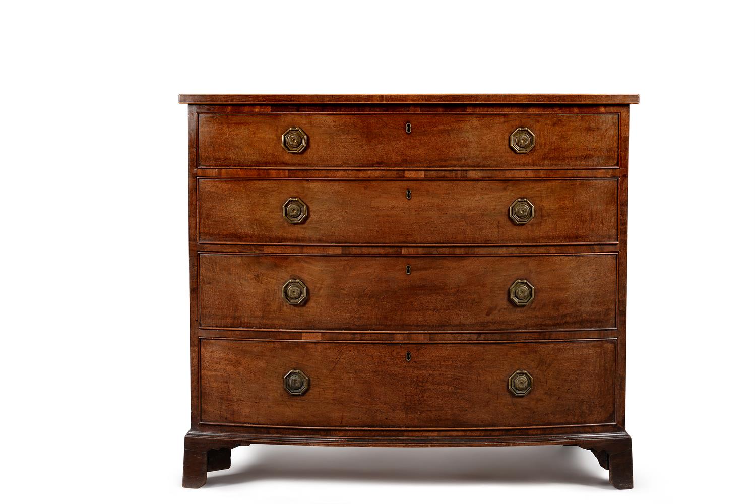 A GEORGE III MAHOGANY BOWFRONT CHEST OF DRAWERS, CIRCA 1800