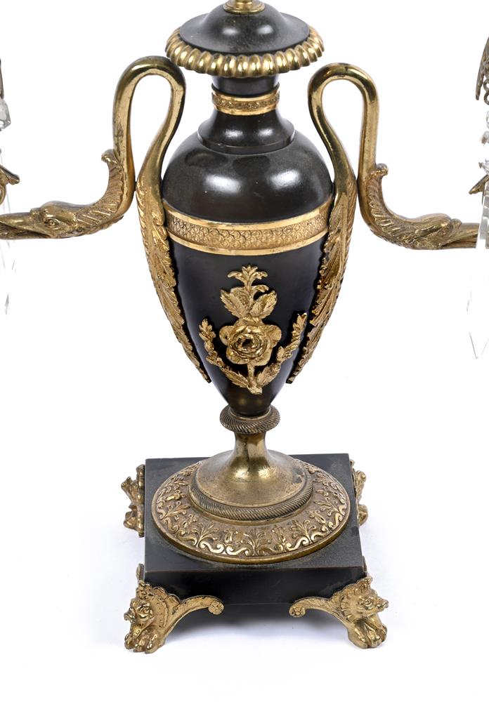 A PAIR OF REGENCY PATINATED AND GILT BRONZE TWIN LIGHT CANDELABRA, EARLY 19TH CENTURY - Image 3 of 3