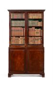 A GEORGE II MAHOGANY CABINET BOOKCASE, CIRCA 1750