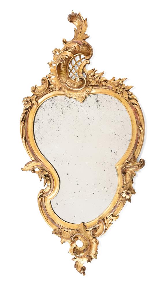 A FRENCH CARVED GILTWOOD MIRROR, IN LOUIS XV STYLE, 19TH CENTURY