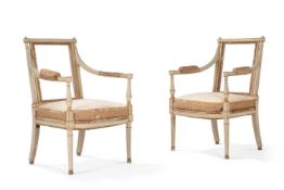 A PAIR OF GEORGE III PAINTED AND PARCEL GILT OPEN ARMCHAIRS,CIRCA 1790