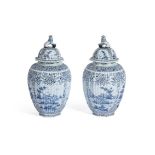 A LARGE PAIR OF DELFT JARS AND COVERS, 19TH CENTURY