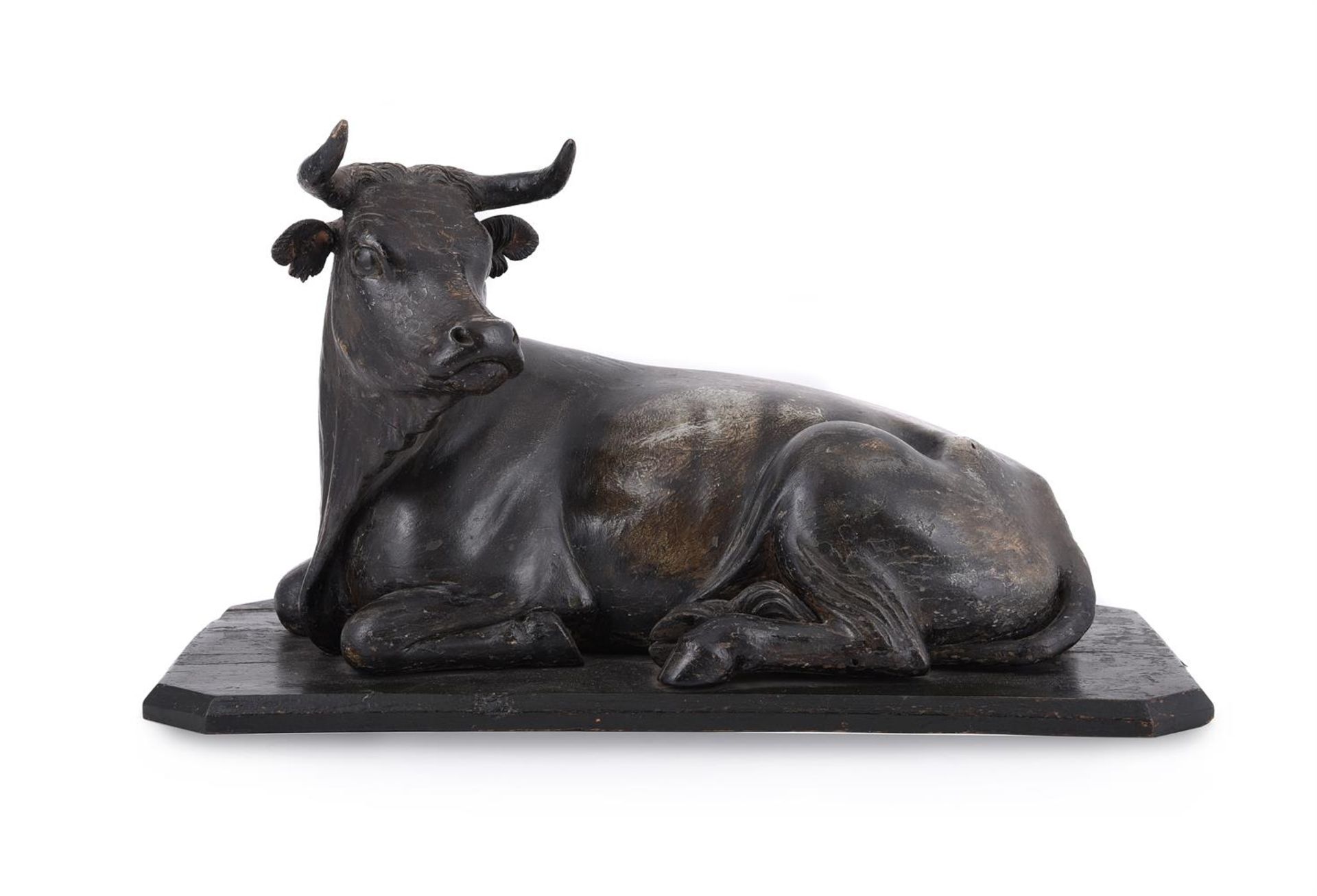 A LARGE NEAPOLITAN CARVED AND POLYCHROME DECORATED CRIB COW FIGURE, 18TH CENTURY