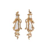 A PAIR OF CARVED GILTWOOD MIRRORS, IN GEORGE III STYLE, 19TH CENTURY