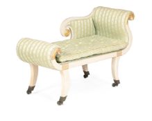A REGENCY CREAM PAINTED AND PARCEL GILT WINDOW SEAT, IN THE MANNER OF GILLOWS, CIRCA 1820