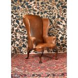 A GEORGE I WALNUT WING ARMCHAIR, CIRCA 1725