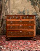 A WILLIAM & MARY OLIVEWOOD, WALNUT AND FRUITWOOD OYSTER VENEERED CHEST OF DRAWERS, CIRCA 1690