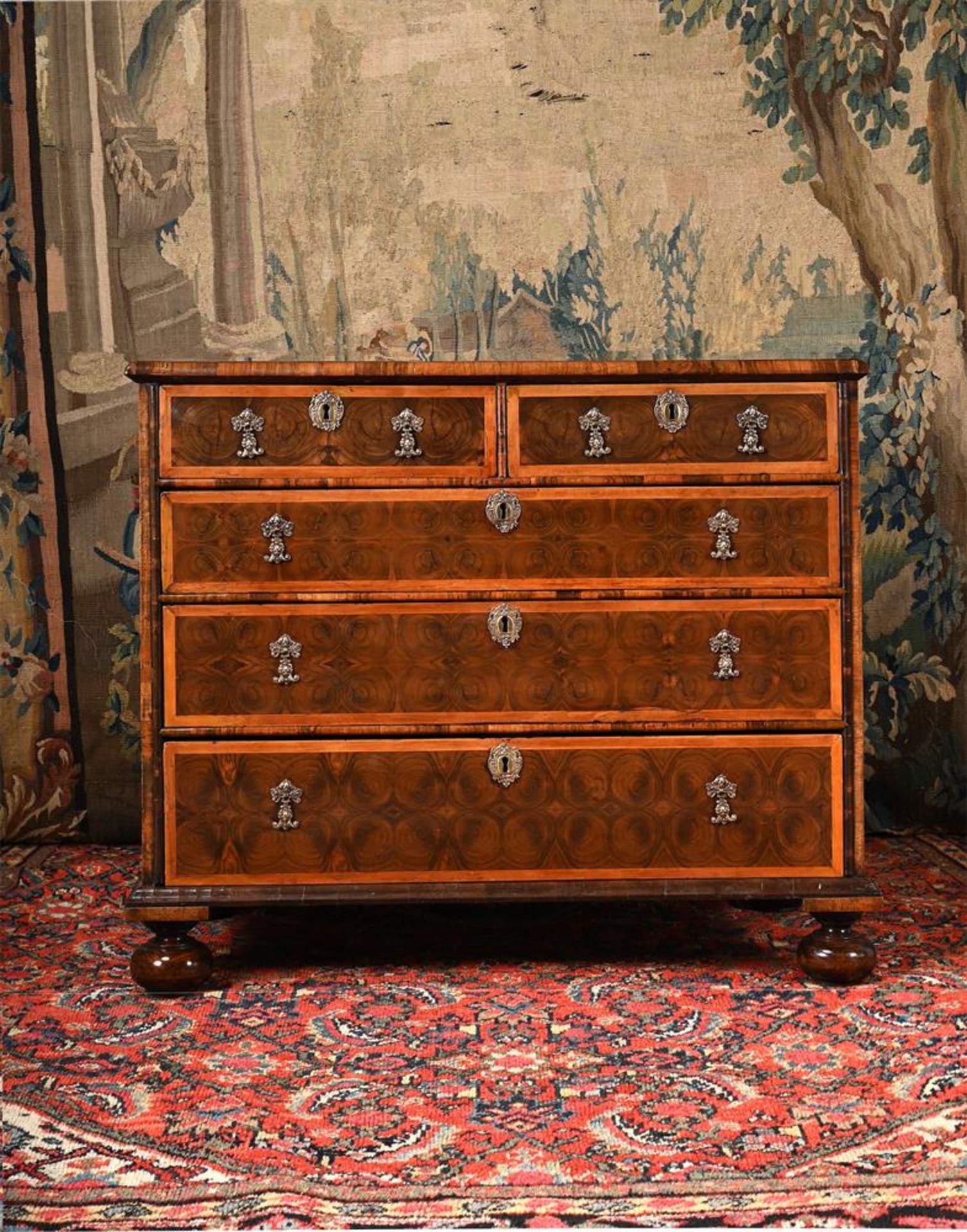 A WILLIAM & MARY OLIVEWOOD, WALNUT AND FRUITWOOD OYSTER VENEERED CHEST OF DRAWERS, CIRCA 1690