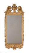 A GEORGE II CARVED GILTWOOD AND GESSO MIRROR, CIRCA 1740