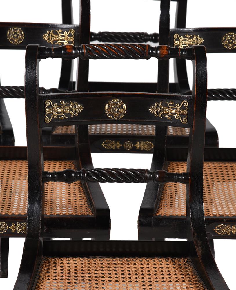 A SET OF TWELVE REGENCY EBONISED BEECH AND GILT METAL MOUNTED DINING CHAIRS, CIRCA 1810 - Image 4 of 6