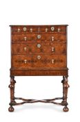 A WILLIAM & MARY OLIVEWOOD OYSTER VENEERED AND YEW CHEST ON LATER STAND, THE CHEST CIRCA 1690