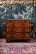 A CHARLES II OLIVEWOOD, WALNUT, FRUITWOOD OYSTER VENEERED AND MARQUETRY CHEST OF DRAWERS, CIRCA 1680
