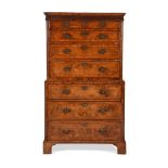 A FINE GEORGE II BURR WALNUT SECRETAIRE CHEST ON CHESTIN THE MANNER OF GILES GRENDEY