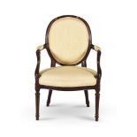 A GEORGE III MAHOGANY ARMCHAIR, IN THE MANNER OF GEORGE HEPPLEWHITE, CIRCA 1780