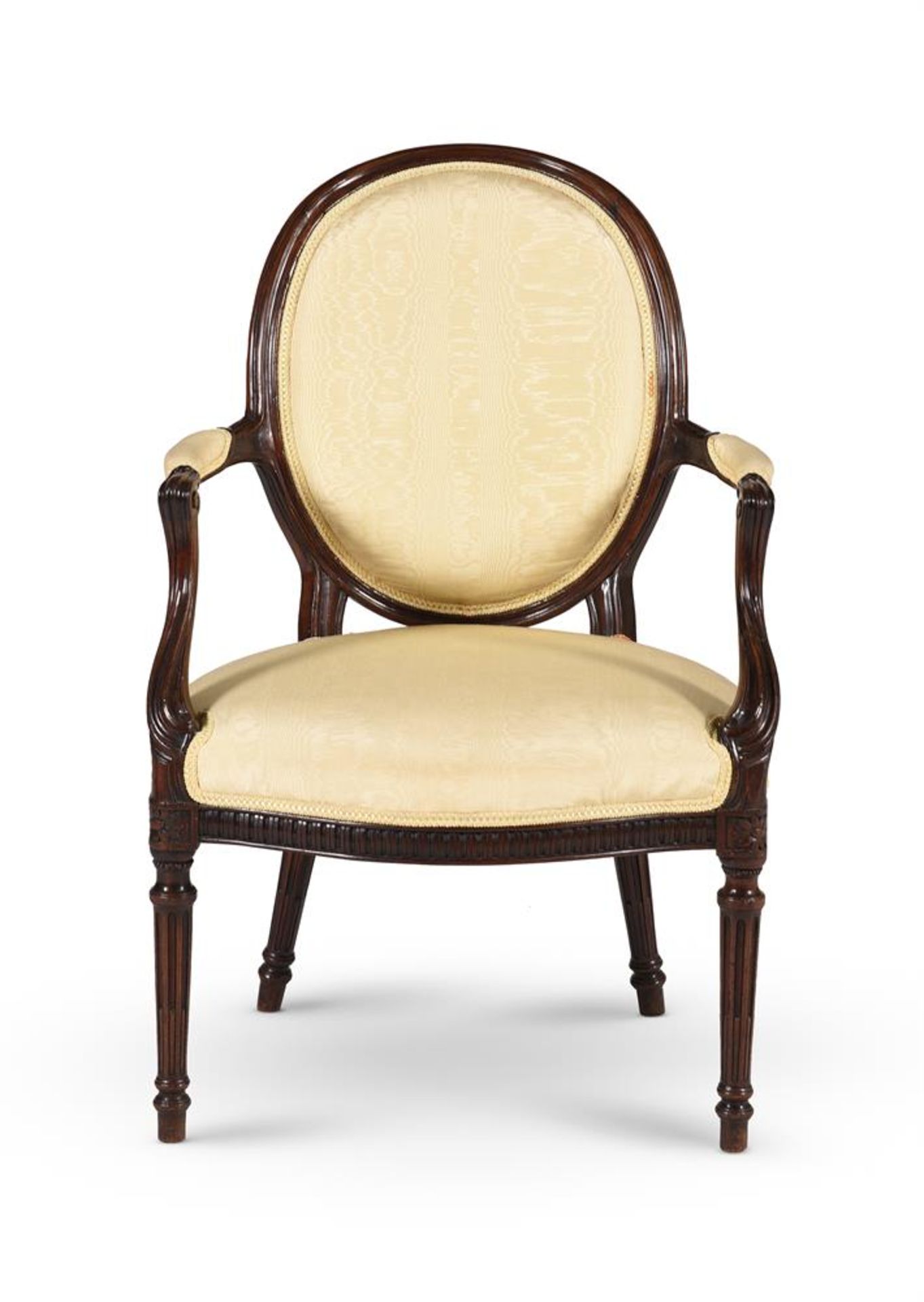 A GEORGE III MAHOGANY ARMCHAIR, IN THE MANNER OF GEORGE HEPPLEWHITE, CIRCA 1780