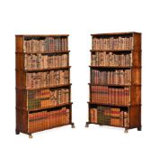 Y A PAIR OF REGENCY ROSEWOOD AND PARCEL GILT 'WATERFALL' OPEN BOOKCASES, CIRCA 1815